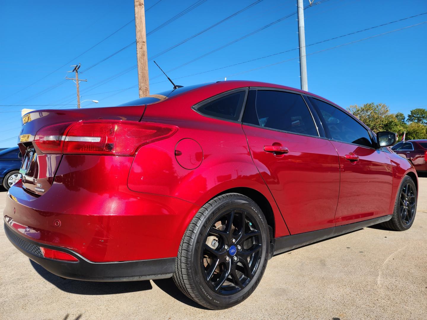 2016 BURGUNDY Ford Focus SE (1FADP3F25GL) with an 2.0L L4 DOHC 16V engine, AUTO transmission, located at 2660 S.Garland Avenue, Garland, TX, 75041, (469) 298-3118, 32.885551, -96.655602 - Welcome to DallasAutos4Less, one of the Premier BUY HERE PAY HERE Dealers in the North Dallas Area. We specialize in financing to people with NO CREDIT or BAD CREDIT. We need proof of income, proof of residence, and a ID. Come buy your new car from us today!! This is a Super Clean 2016 FORD FOCUS - Photo#3